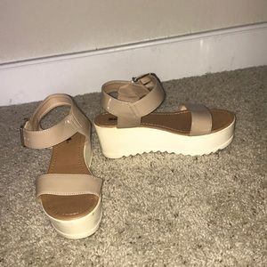 Platform sandals.